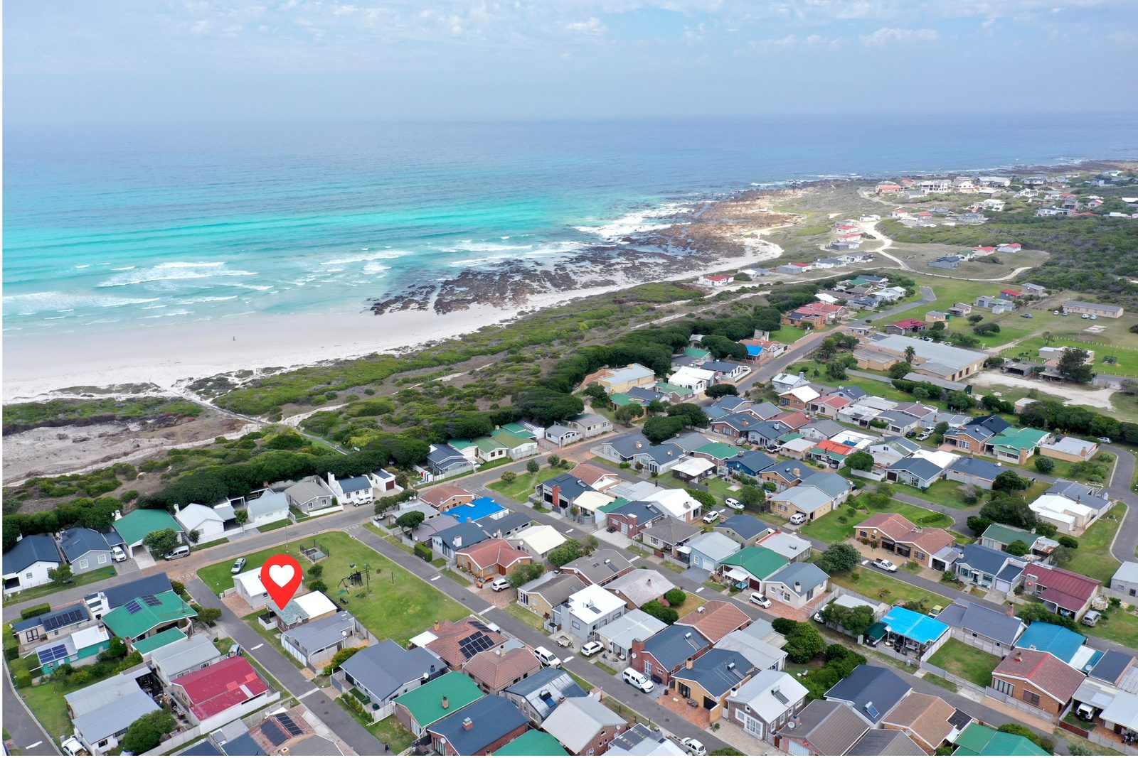 Pearly Beach coastline from the air, looking west Aerial view of the Pearly Beach coastline looking west, taken from above the resort